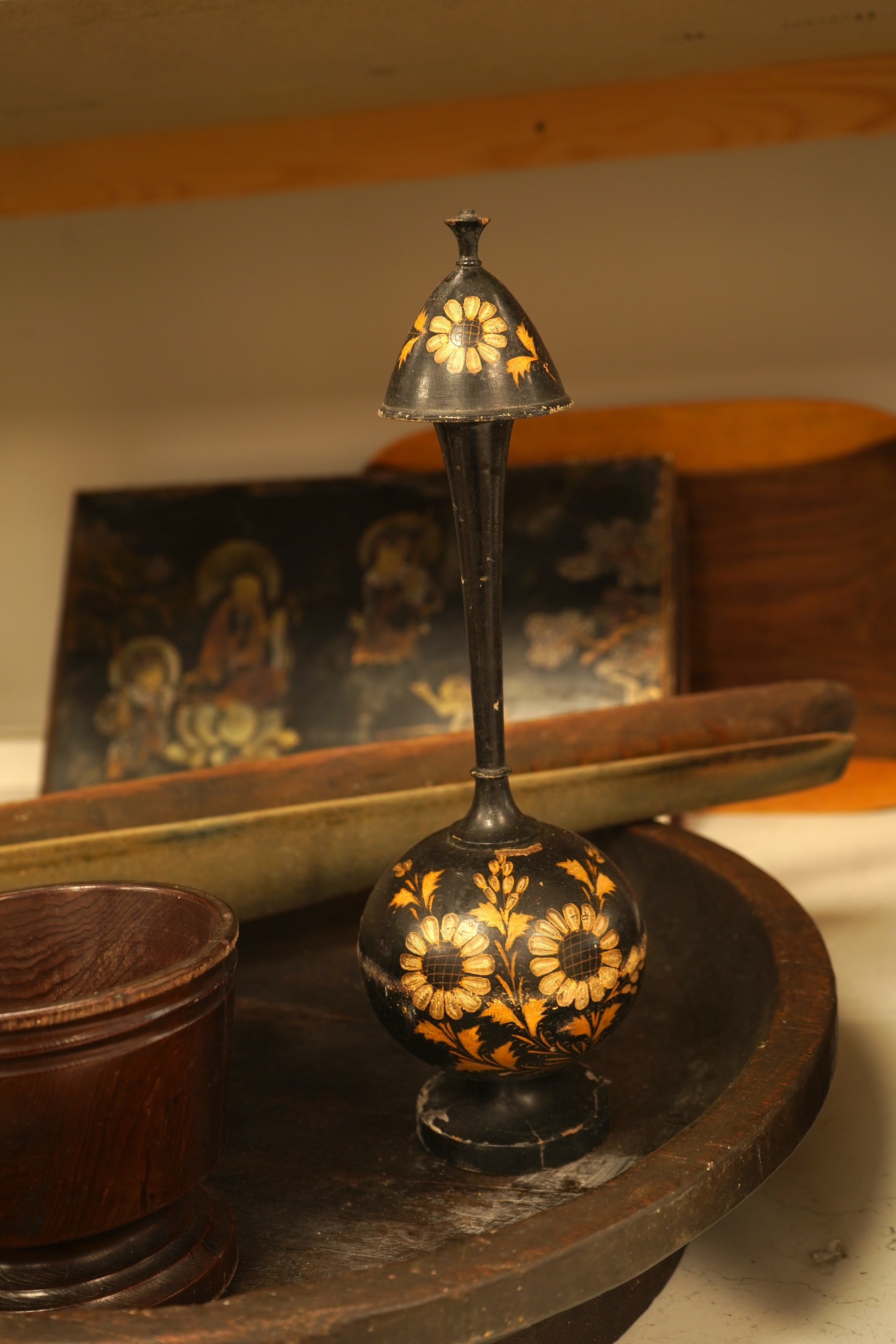 A quantity of mixed treen, including an inlaid box, carved head, large bowl etc and an 18th century French rat de cave wrought iron and treen candlestick. Bowl 49cm